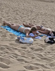 Two plump ass college babes face down ass up sunbathing in thong bikinis