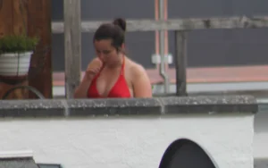 Thick babe in the backyard in red bikini