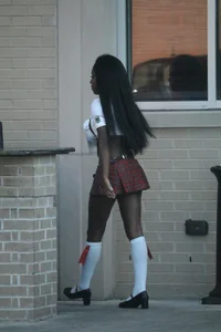 Sexy ebony Tilted Kilt employee in her uniform