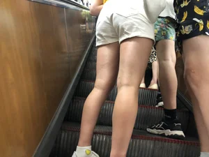 Firm Booty in Shorts and Fit Legs - Girl on an Escalator Low Angle Creepshots