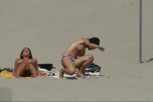 Girls on a nude beach in Sitges, Spain