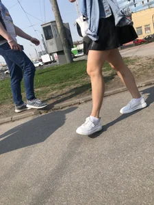 Awesome Candid Girl in a Leather Skirt And Sneakers Walking Down a Street, Then Flashing Her White Panties on the Stairs Creepshots Gallery
