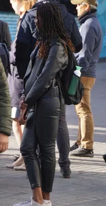 Black babe out in tight shiny pants with slight vpl