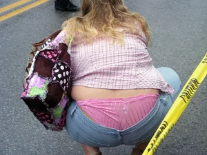 Candid Girl in Tight Jeans Squatting on the Street With Her Pink Panties Sticking Out Creepshot