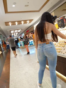 Brazilian Butt highest level. Tanlines peeking out of the Jeans