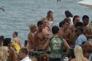 Topless girls on a beach in Barcelona