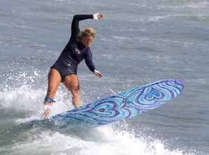 Candid surfer babes on the beach and in bikinis
