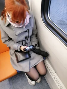 Cute Redhead in Black Pantyhose Sitting in Public Train Candid Photos