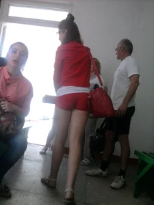 Girl in Mini Shorts and Sandals Candid