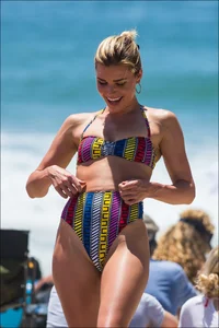 Beach girl with an incredible body in a funky looking bikini