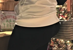 Christmas store girl with a nice booty in leggings with vpl