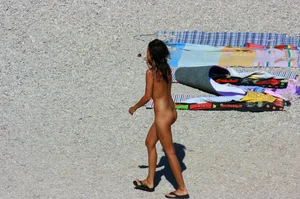 Ula FKK Sexy brunette on a nude beach topless, bottomless and with blue thong