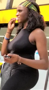 Sexy braless ebony babe in tight skirt with pokies