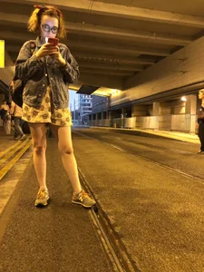 Cute candid girl in a dress with nice legs