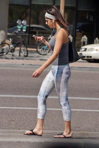 Flat ass brunette walking in leggings with big boobs
