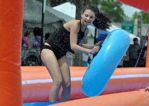 Beautiful brunette tube girl in black bikini