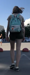 Cute Dorky Girl in Shorts with Thin Muscular Legs Street Candid Photos
