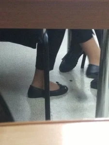 Teen Candid Girl's Feet in Flats in College Class Photo, Closeup Under the Desk