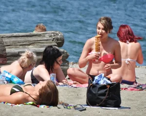 Group of sexy girls in bikinis at the beach