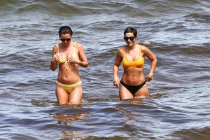 Frankie Bridge nip slips in a bikini on the beach
