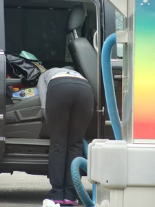 Girls cleaning their cars in jeans and pants