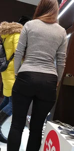 Big booty employee in tight black jeans with slight vpl