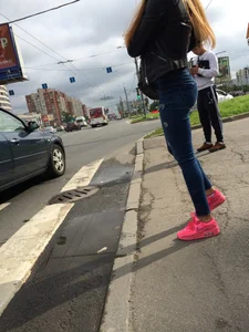 Hot Girl in Tight Blue Jeans And Bright Pink Sneakers on a Crosswalk Street Booty Creepshots Collection