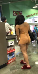 Latina with hard nipples and a big booty in tight spandex shorts outfit