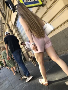Cute candid girl in pink shorts street photos