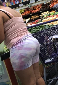 Thick Latina babe with a nice ass in tight patterned shorts