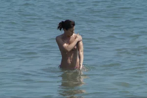 Girls on a nude beach in Sitges, Spain