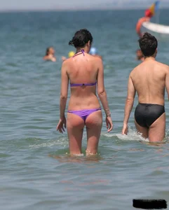 A bunch of sexy beach voyeur babes in bikinis, thongs and topless