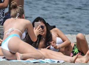 Blondie and two asian girls put on sunscreen (pt 2) [062]
