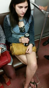Candid girls with hot legs sitting in subway trains