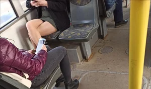 Nice Legs in Pantyhose and a Skirt in a Public Bus