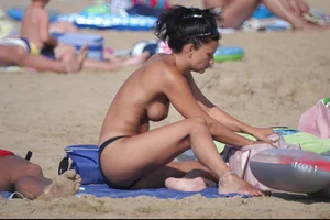 Girls on a nude beach in Bibione, Italy