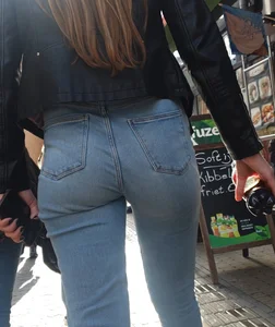 Nice looking girl with a little sexy bubble ass in tight jeans