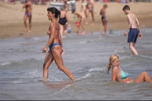 Girls on a nude beach in Bibione, Italy
