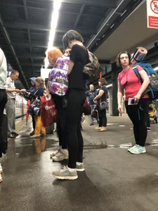 Teen Girl in Tights And Sneakers Standing on the Train Platform VPL Photos