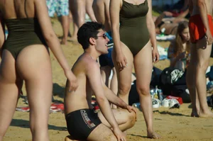 Milf with Amazing Fit Ass in Green One-Piece Swimsuit Playing Volleyball on the Beach Creepshots Gallery