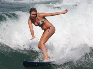 Candid surfer babes on the beach and in bikinis