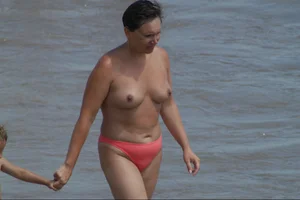 Girls on a nude beach in Sitges, Spain