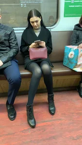 Girl in Black Pantyhose in the Subway Train - Sexy Slender Legs