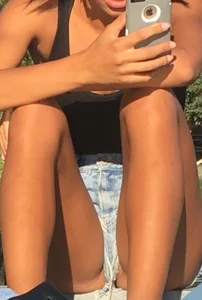 Sexy bikini babe up close removing her shorts and showing her tight ass in a bikini