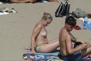 Girls on a nude beach in Sitges, Spain