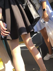 Public bus candid girl in a dress and slim legs in pantyhose