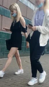 Cute blonde candid teen girl wearing a short dress walking down the street creepshot