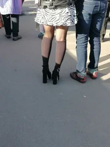 Awesome candid blonde wearing a zebra skirt and knee-high boots street creepshot, nice skinny legs closeups