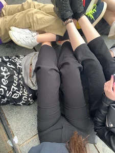 Teen Girls’ Legs Intertwined