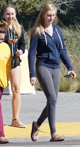 Skinny Arizona State University blonde college girl in grey leggings